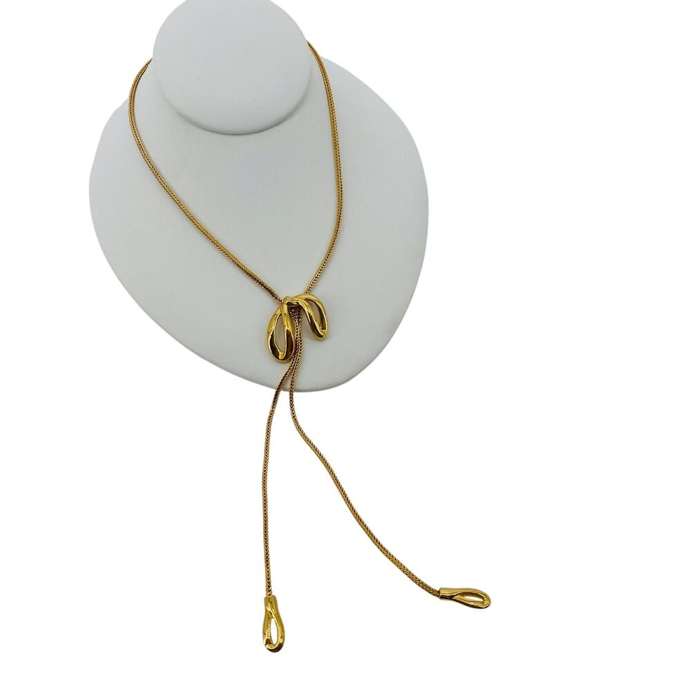Vintage monet gold bow bolo tie style Necklace
